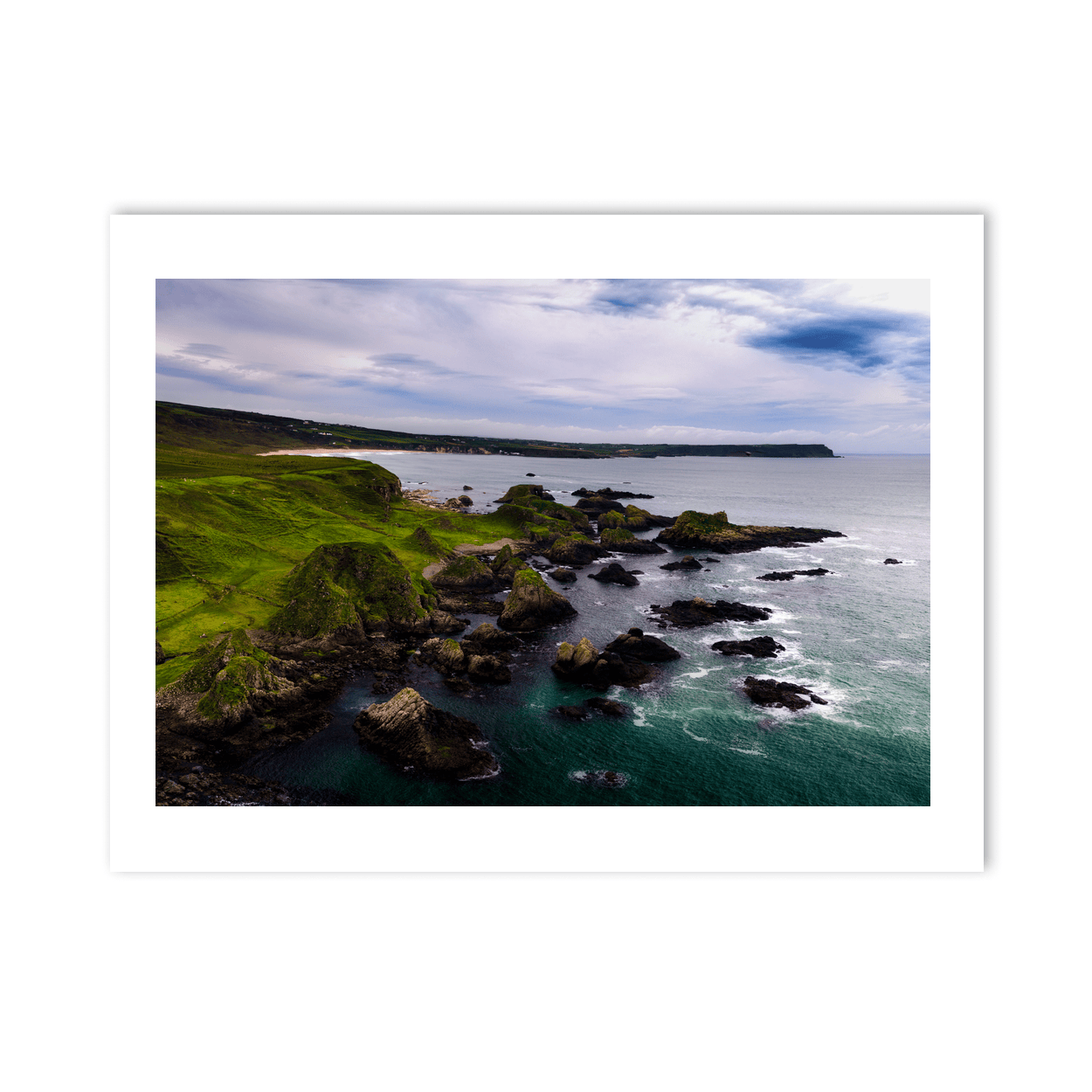 antrim-coast-green-cliffs-rocky-shore-aerial PM