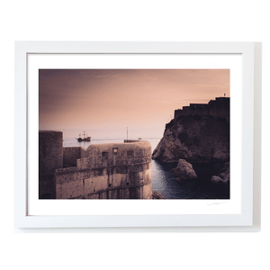 Nua Photography Print Dubrovnik Fortress Walls and Sailing Ship at Sunset, Croatia Dubrovnik Fortress Walls Sunset Print | Nua Photography