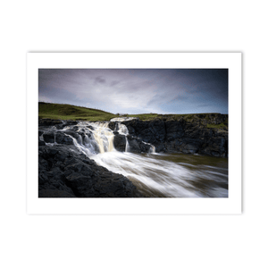 dunseverick-waterfall-flowing-into-sea PM