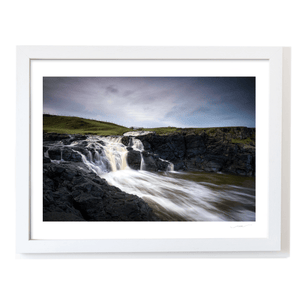 dunseverick-waterfall-flowing-into-sea WF