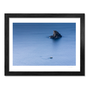 fishing-boat-sea-stack-calm-atlantic-waters BF