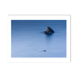 fishing-boat-sea-stack-calm-atlantic-waters PM