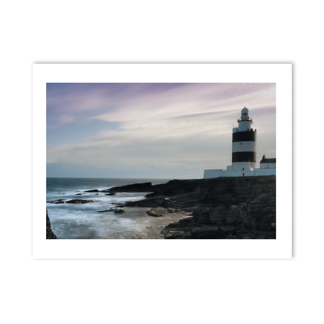 hook-lighthouse-dramatic-dusk-rocky-coastline PM