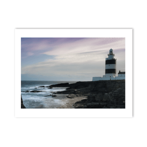 hook-lighthouse-dramatic-dusk-rocky-coastline PM