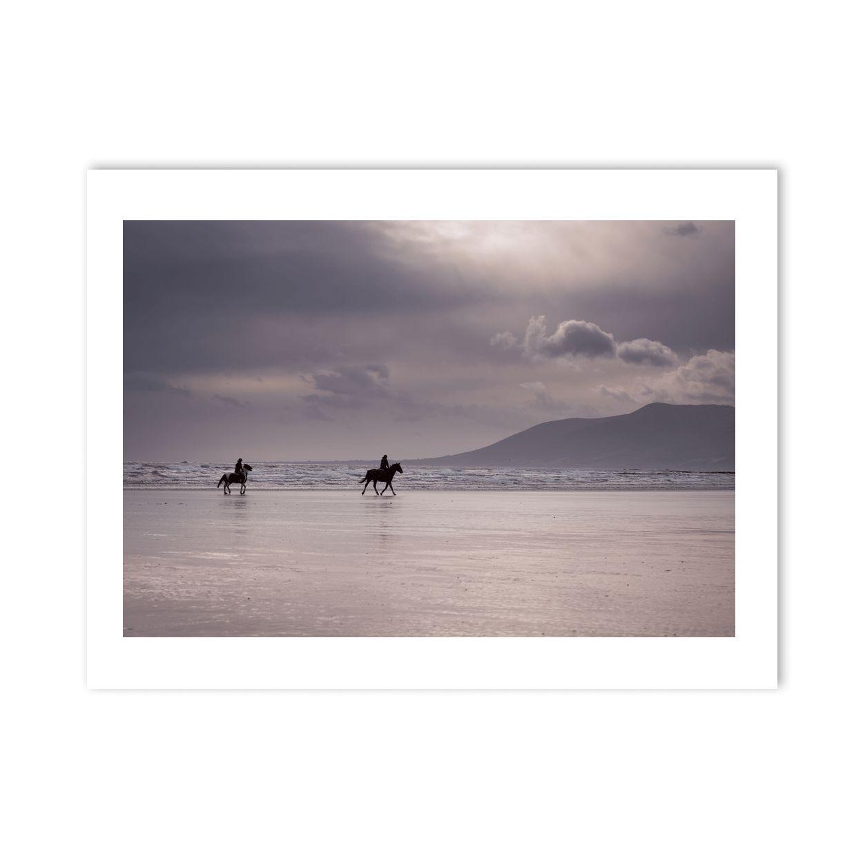 horse-riders-beach-moody-skies-mountains PM