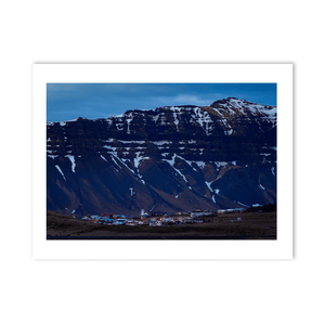 Nua Photography Print Icelandic Village Beneath Snow-Capped Mountains at Dusk, Iceland Icelandic Village Snow-Capped Mountains Dusk Print | Nua Photography