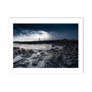 lighthouse-dramatic-storm-light-rocky-shore PM