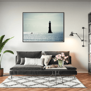 lighthouse-silhouette-shimmering-sea-down BFW