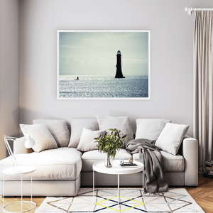 lighthouse-silhouette-shimmering-sea-down WFW