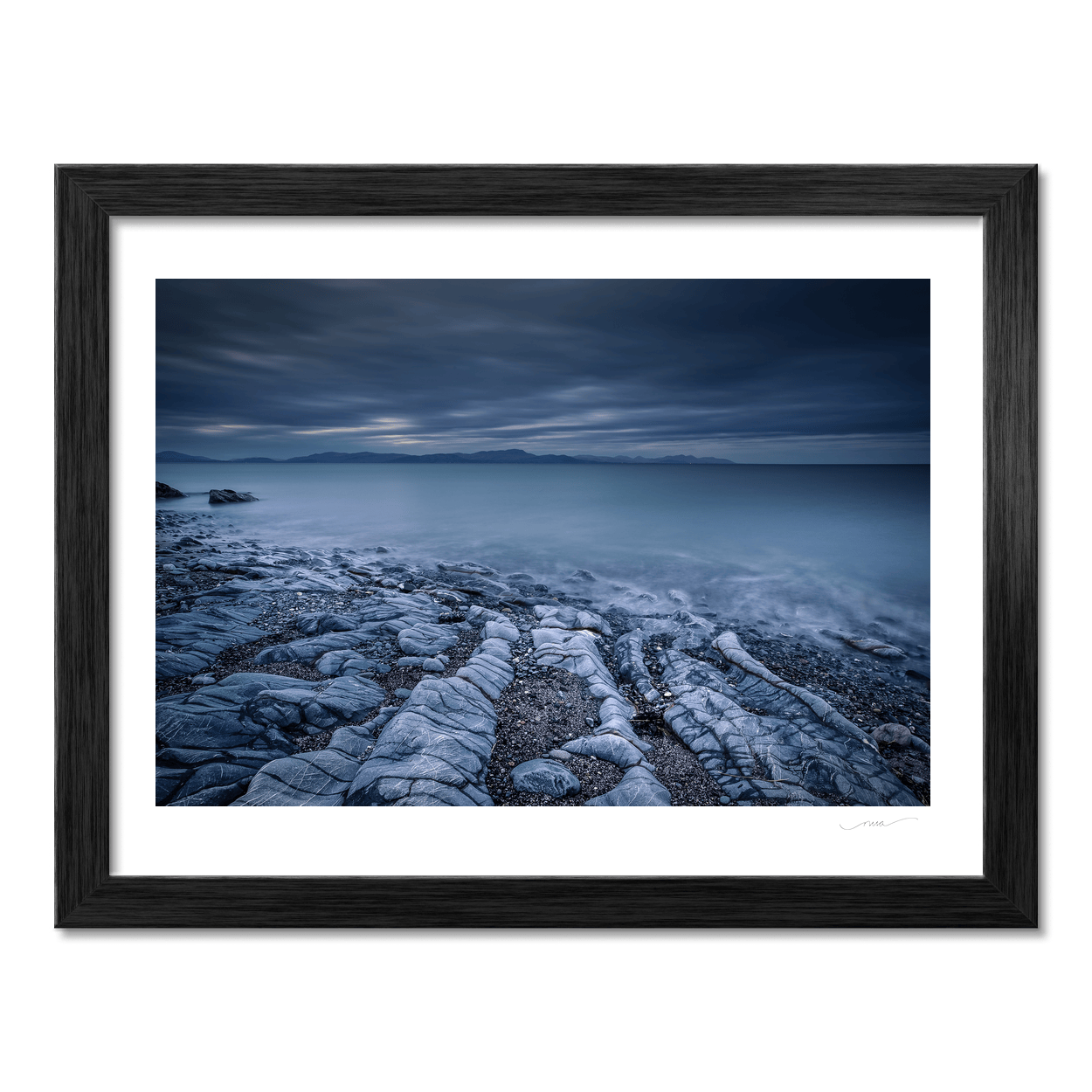 rocky-shoreline-misty-sea-moody-skies PM