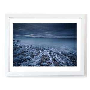 rocky-shoreline-misty-sea-moody-skies WF