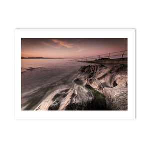 rocky-shoreline-sunset-calm-waters-louth PM