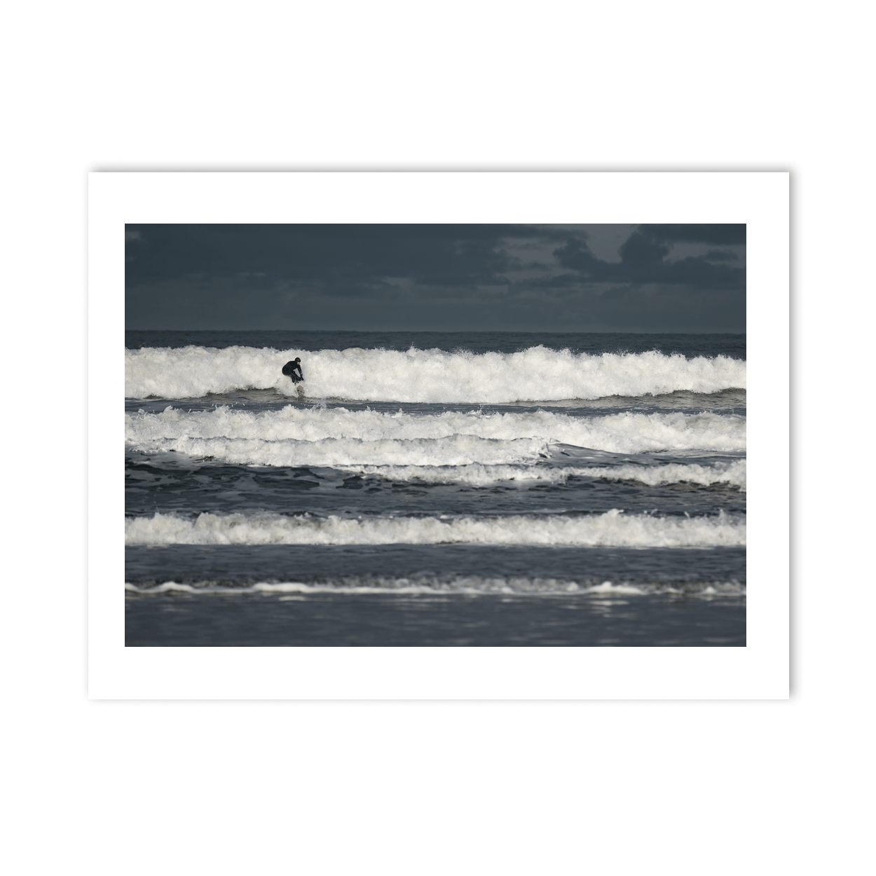 surfer-riding-wave-stormy-antrim-coast PM