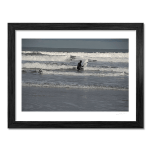 surfer-wading-into-waves-antrim-coast BF