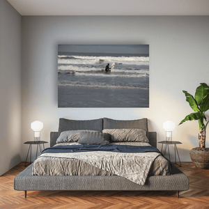 surfer-wading-into-waves-antrim-coast Pano