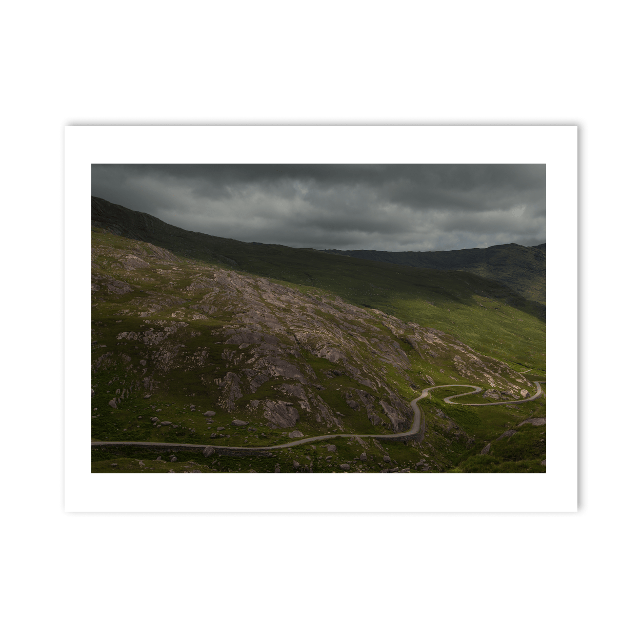 winding-mountain-road-moody-skies-cork PM