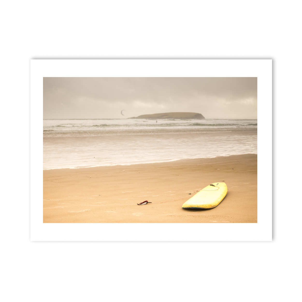 yellow-surfboard-sandy-beach-overcast-day PM