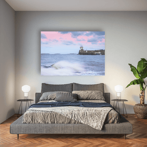 Nua Photography Print Balbriggan Lighthouse with pink evening skies and waves