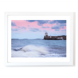 Nua Photography Print Balbriggan Lighthouse with pink evening skies and waves