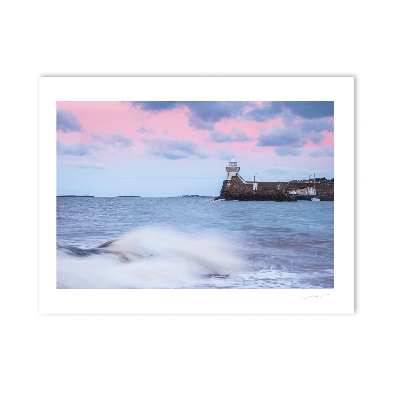 Nua Photography Print Balbriggan Lighthouse with pink evening skies and waves