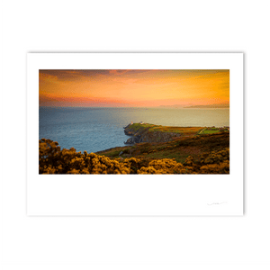 The sun sets at the Bailey Lighthouse